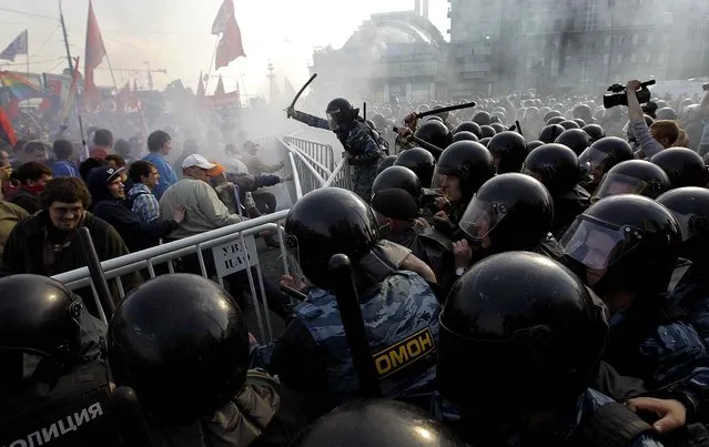 Police disperse opposition and begin to arrest protesters in downtown Moscow on May 6, 2012. The protesters were trying to reach the Kremlin in a demonstration on the eve of Vladimir Putin's inauguration as president