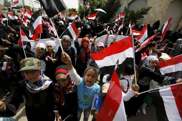 Women and children demonstrate against the Saudi-led coalition outside the offices of the United Nations in Yemen's capital Sanaa August 11, 2015. (Photo by Khaled Abdullah/Reuters)