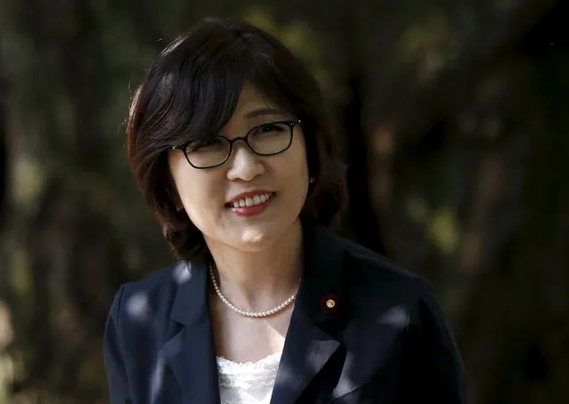 Tomomi Inada, head of the Policy Research Council of Prime Minister Shinzo Abe's Liberal Democratic Party, smiles as she arrives at Yasukuni Shrine to offer prayers in Tokyo August 15, 2015, to mark the 70th anniversary of Japan's surrender in World War Two. (Photo by Issei Kato/Reuters)