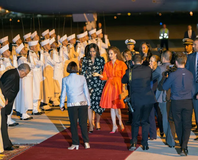 U.S. first lady Michelle Obama (centre, L) is welcomed by Princess Lalla Salma (centre, R) of Morocco as she arrives at the Marrakech International airport, early June 28, 2016. (Photo by Youssef Boudlal/Reuters)