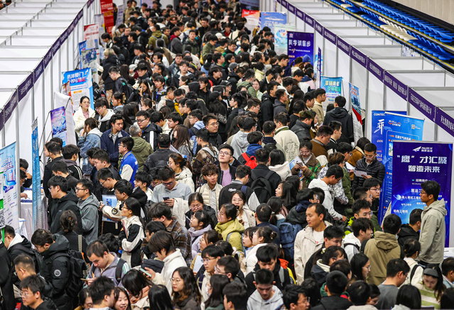 Pepole attend a job fair in Shenyang, in northeastern China's Liaoning province on October 22, 2024. (Photo by AFP Photo/China Stringer Network)