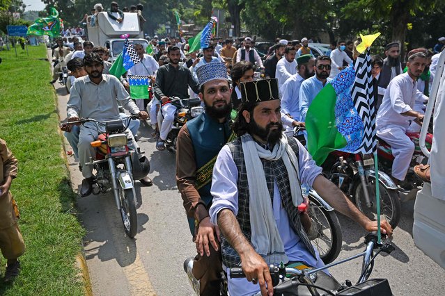 Sunni Muslims take part in a rally to celebrate Eid-e-Milad-un-Nabi, the birthday of Prophet Mohammed, in Islamabad on September 17, 2024. (Photo by Aamir Qureshi/AFP Photo)