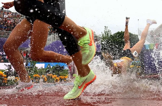 Lea Meyer of Team Germany falls into the water obstacle during the Women’s 3000m Steeplechase heats on day two of the World Athletics Championships Oregon22 at Hayward Field on July 16, 2022 in Eugene, Oregon. (Photo by Kai Pfaffenbach/Reuters)