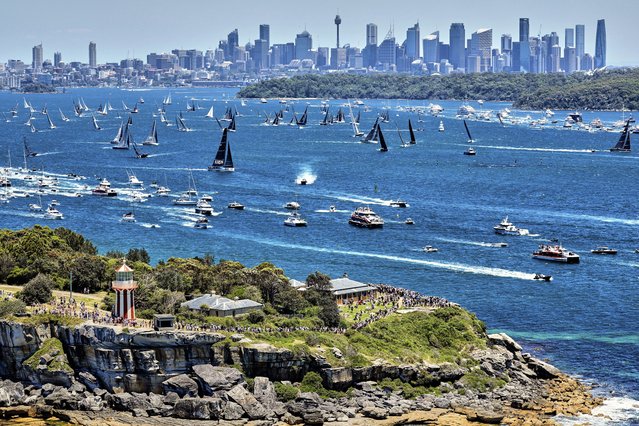 This handout image taken and received from Rolex on December 26, 2024 shows yachts competing at the start of the annual Sydney to Hobart yacht race on Boxing Day on Sydney Harbour. (Photo by Carlo Borlenghi/ROLEX/AFP Photo)