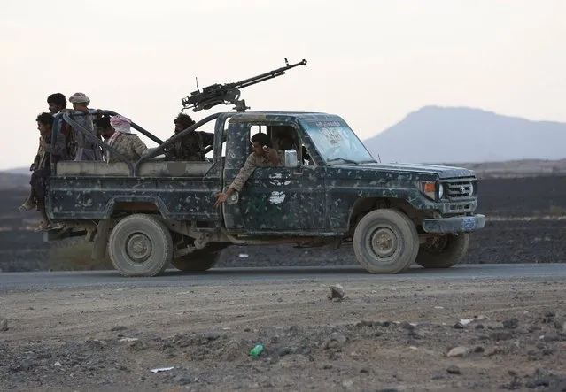 Soldiers loyal to Yemen's exiled government ride in a military truck during fighting with Houthi militia in Yemen's central province of Marib September 13, 2015. (Photo by Reuters/Stringer)