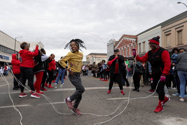 People jump rope in front of the Edmund Pettus Bridge during the commencement of the 60th anniversary of “Bloody Sunday” in Selma, Alabama on March 9, 2025. (Photo by Alyssa Pointer/Reuters)
