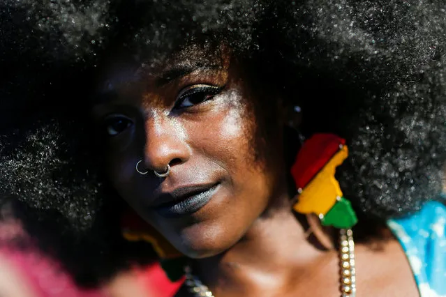 A woman takes part in the Annual Afropunk Music festival in the borough of Brooklyn in New York, U.S., August 27, 2016. (Photo by Eduardo Munoz/Reuters)