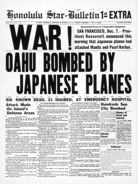 7th December 1941:  The newspaper tells of bombing in downtown Honolulu an hour and a half after the attack on Pearl Harbour (Pearl Harbor) by the Japanese airforce.  (Photo by Three Lions/Getty Images)