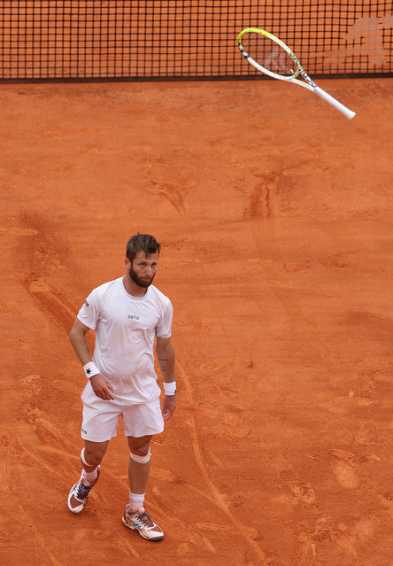 Corentin Moutet of France throws his racket against David Goffin of Belgium during the Qualifying Final round during day one of the Rolex Monte-Carlo Masters at Monte-Carlo Country Club on April 06, 2025 in Monte-Carlo, Monaco. (Photo by Clive Brunskill/Getty Images)