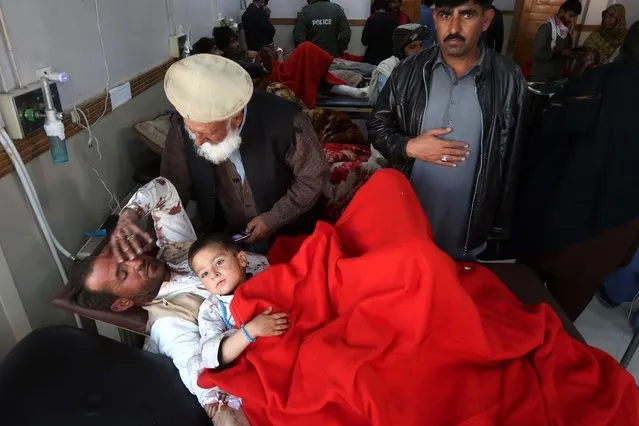 Zafar and his son, who were injured in a bomb blast get medical treatment in a local hospital, Zafar loses his wife and son in the blast in Quetta, the provincial capital of Baluchistan, Pakistan, 30 November 2022. At least two policeman and one citizen were killed and 24 people, including 16 police personnel, were injured in an explosion in the Baleli area of Quetta. According to the police, a truck of the Balochistan Constabulary was targeted in the blast, and a vehicle passing by was also hit by it. (Photo by Fayyaz Ahmad/EPA/EFE/Rex Features/Shutterstock)