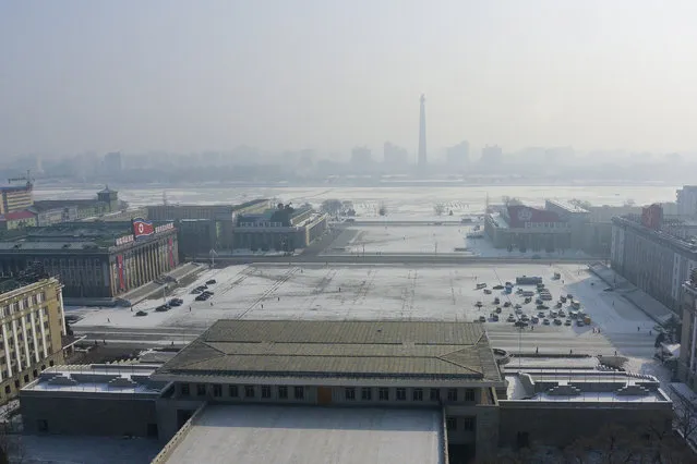 Government buildings in the capital – the flag can be seen atop of the offices in February 2013, in Pyongyang, North Korea. (Photo by Andrew Macleod/Barcroft Media)