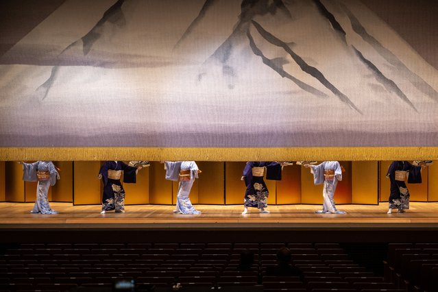 This picture taken on May 20, 2025 shows Shinbashi geishas rehearsing at the Shinbashi Enbujo Theatre before the 100th Azuma Odori festival in Tokyo. Geishas are a rare sight in modern Japan, but some of the few still working in Tokyo glide with measured steps across a wooden stage, offering a glimpse of a long-misunderstood tradition. (Photo by Philip Fong/AFP Photo)