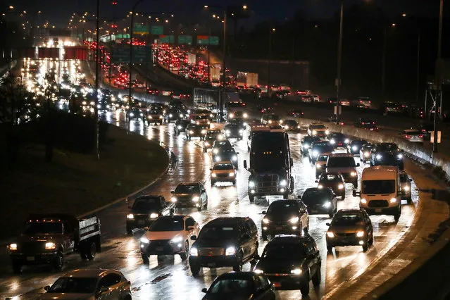 Travellers take to the roads ahead of the Thanksgiving holiday during the coronavirus disease (COVID-19) outbreak, in Chicago, Illinois, U.S. November 24, 2020. (Photo by Kamil Krzaczynski/Reuters)
