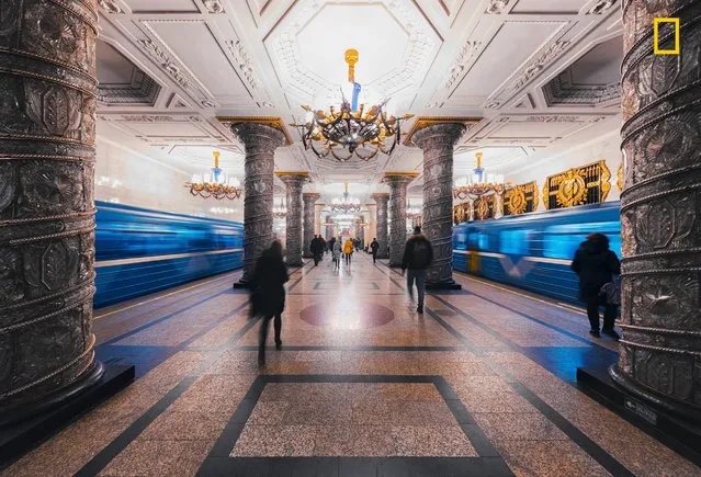 “A Palace for the People”. “Architectural beauty doesn’t stop at the old awe-inspiring palaces in St. Petersburg. Going into the underground opens up a real feast for the eyes while walking through the marvelous metro stations”. (Photo by Christian Baumgartner/National Geographic Travel Photographer of the Year Contest)