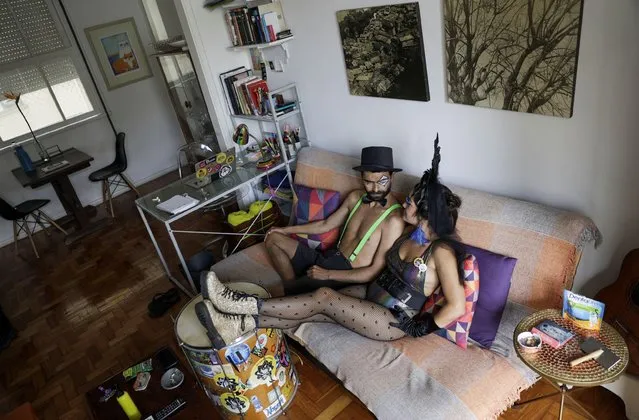Giulia Tucci and her husband Marcelo Azevedo wear costumes which they would wear during the Carnival celebrations which would be held from February 12 until February 17, but were cancelled due the coronavirus disease (COVID-19) pandemic, in Rio de Janeiro, Brazil on February 9, 2021. “Carnival for me means resistance and joy, and the people occupying the streets during the carnival celebrations had been also a political resistance movement, but this year it is necessary to not have these celebrations and the real resistance is to avoid these streets occupations and being at home”. Tucci said. (Photo by Ricardo Moraes/Reuters)