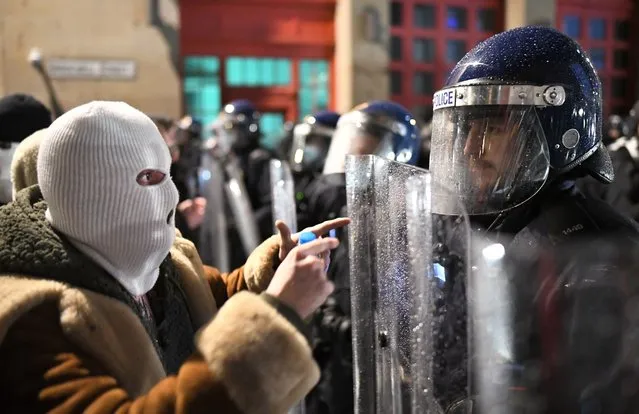 Protesters confront police officers during a “Kill The Bill” protest on March 26, 2021 in Bristol, England. A similar “Kill the Bill” protest, in opposition to the a new Police, Crime, Sentencing and Court Bill, turned violent last week as demonstrators clashed with police and set a police van on fire. The proposed legislation, which would apply to England and Wales, covers a wide range of issues, would broaden the police's authority for regulating protests. (Photo by Matthew Horwood/Getty Images)