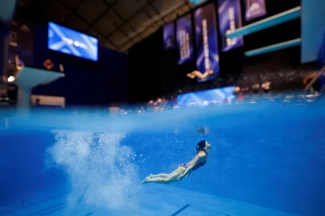 A diver in action during a practice session at the Fukuoka 2023 World Aquatics Championships in Fukuoka, Japan on July 18, 2023 . (Photo by Stefan Wermuth/Reuters)