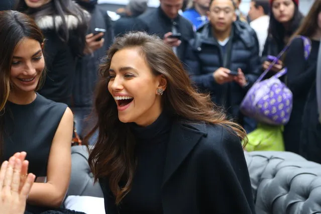 Sports Illustrated swimsuit models Irina Shayk enjoys a laugh with fellow models at the SwimCity festival in New York City on Monday February 9, 2015. (Photo by Gordon Donovan/Yahoo News)