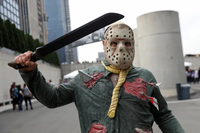 A person dressed up as Jason Voorhees from Friday the 13th, attends the 2018 New York Comic Con in Manhattan, New York on October 4, 2018. (Photo by Shannon Stapleton/Reuters)