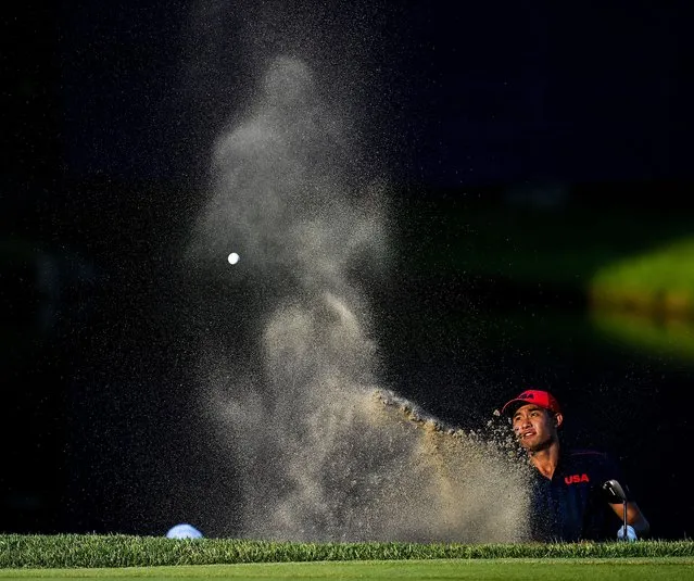 Collin Morikawa of USA chips out of a bunker on the 18th during the bronze medal play-off in round 4 of the men's individual stroke play at the Kasumigaseki Country Club during the 2020 Tokyo Summer Olympic Games in Kawagoe, Saitama, Japan on August 1, 2021. (Photo By Ramsey Cardy/Sportsfile via Getty Images)