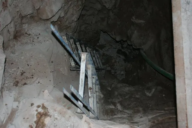 A sophisticated smugglers' tunnel, fitted with lights, water pumps and a ventilation system, running under the Arizona border from Mexico found by U.S. border police, May 9, 2011. (Photo by Reuters/U.S. Border Patrol)