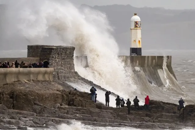 Waves crash against the harbour wall on January 21, 2024 in Porthcawl, Wales. The Met Office issued an amber weather warning for all of Wales as it predicted “Storm Isha” would bring winds consistently of 50-60 mph, with winds of 70-80 mph possible in coastal areas. (Photo by Matthew Horwood/Getty Images)