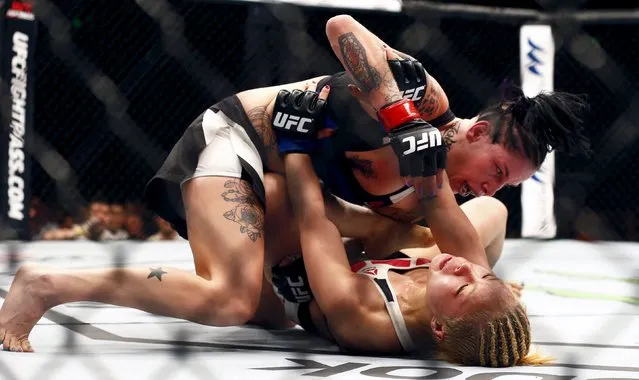 Mixed Martial Arts, Ultimate Fighting Championship (UFC) Fight Night, Lightweight Bout, Brisbane Entertainment Centre, Brisbane, Australia on March 20, 2016: Seohee Ham in action with Bec Rawlings. (Photo by Jason O'Brien/Reuters)