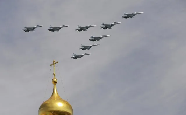 Russian Sukhoi Su-30SM Flanker-C fighters and Su-35S Super-Flanker fighters fly in formation over the Red Square during the Victory Day parade in Moscow, Russia, May 9, 2015. (Photo by Reuters/Host Photo Agency/RIA Novosti)