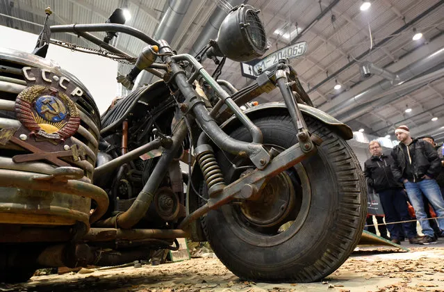 A giant, so called “Tank Bike”, driven by an engine of a T55 tank and constructed of former military equipment is pictured at a bike fair in Hamburg, Germany, February 25, 2017. (Photo by Fabian Bimmer/Reuters)