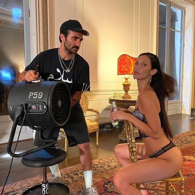 American model Bella Hadid shares a behind-the-scenes photo from a lingerie shoot on December 28, 2021. (Photo by bellahadid/Instagram)