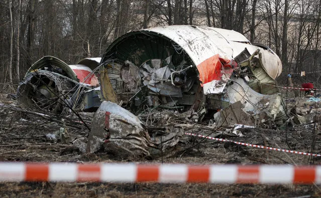 This Sunday April 11, 2010 file photo, shows the wreckage of the Polish presidential plane which crashed early Saturday in Smolensk, western Russia. Polish prosecutors allege Monday April 3, 2017, that a new analysis of evidence into the 2010 plane crash that killed Polish president Lech Kaczynski, shows that two Russian air traffic controllers and a third person in the control tower willingly contributed to the disaster, although they have withheld details of their evidence. (Photo by Sergey Ponomarev/AP Photo)