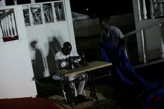 Workers use a sewing machine during the preparation for the inauguration of President-elect Jovenel Moise at the National Palace in Port-au-Prince, Haiti, February 6, 2017. (Photo by Andres Martinez Casares/Reuters)