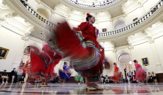 Ballet Folklorico dancers from Rio Grande City perform in the Rotunda of the Texas State Capitol, Wednesday, April 19, 2017 in Austin, Texas. (Photo by Eric Gay/AP Photo)