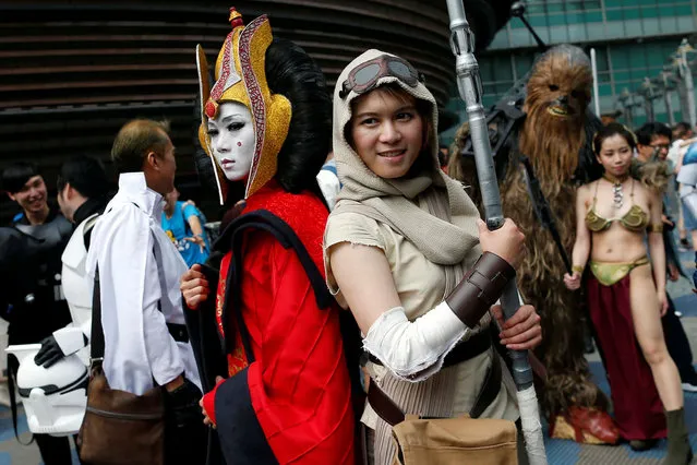 Fans dressed as the characters from “Star Wars” react during Star Wars Day in Taipei, Taiwan on May 4, 2017. (Photo by Tyrone Siu/Reuters)