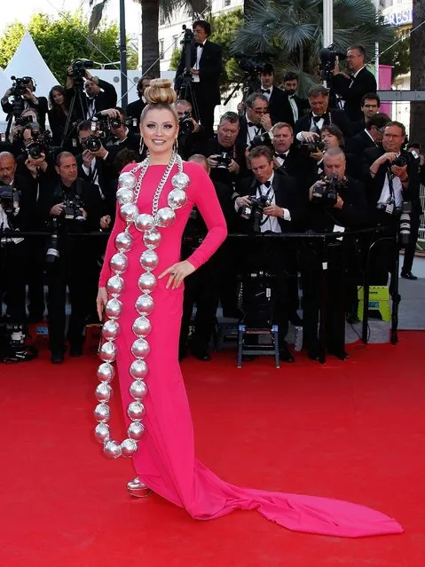 Former Russian real TV contestant Elena Lenina poses as she arrives for the screening of the film “Mr. Turner” at the 67th edition of the Cannes Film Festival in Cannes, southern France, on May 15, 2014. (Photo by Valery Hache/AFP Photo)