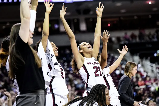 South Carolina forward Mikiah Herbert Harrigan (21) and Victaria Saxton (5) celebrate a score during the second half of an NCAA college basketball game against Purdue, Sunday, December 15, 2019, in Columbia, S.C. (Photo by Sean Rayford/AP Photo)