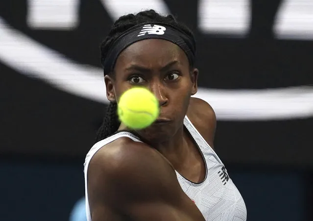 Coco Gauff of the U.S. makes a backhand return to Japan's Naomi Osaka during their third round singles match at the Australian Open tennis championship in Melbourne, Australia, Friday, January 24, 2020. (Photo by Lee Jin-man/AP Photo)
