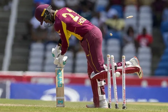 West Indies' Akeal Hosein is bowled by India's Arshdeep Singh during the first T20 cricket match at Brian Lara Cricket Academy in Tarouba, Trinidad and Tobago, Friday, July 29, 2022. (Photo by Ricardo Mazalan/AP Photo)