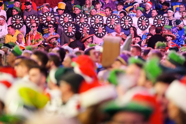 A general view of spectators in fancy dress on day seven of the Paddy Power World Darts Championship at Alexandra Palace, London on Saturday, December 21, 2024. (Photo by Zac Goodwin/PA Images via Getty Images)
