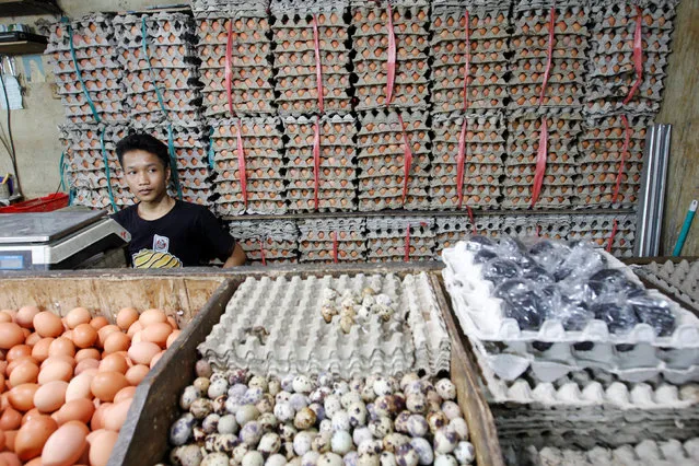 An egg seller waits for customers at a traditional market in south Jakarta, Indonesia August 1, 2016. (Photo by Iqro Rinaldi/Reuters)