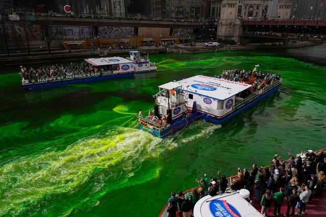 The Chicago River is dyed green as part of annual St. Patrick's Day festivities Saturday, March 15, 2025, in Chicago. (Photo by Erin Hooley/AP Photo)