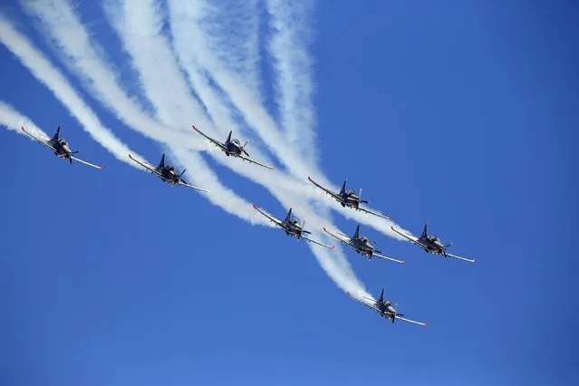 The Polish Air Force Orlik Aerobatic Team, flying PZL-130 Orlik aircrafts, take part in a display during the Malta International Airshow at Malta International Airport, outside Valletta, Malta, September 27, 2015. (Photo by Darrin Zammit Lupi/Reuters)