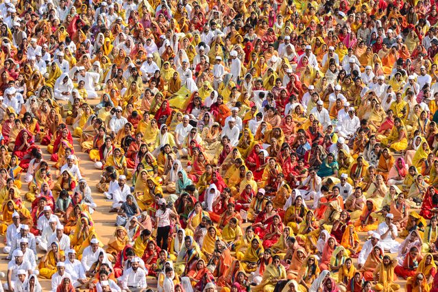 Devotees from the Jain community take part in a mass recitation of a mantra on “Vishwa Navkar Mahamantra Day” at a stadium in Jabalpur on April 9, 2025. (Photo by Uma Shankar Mishra/AFP Photo)