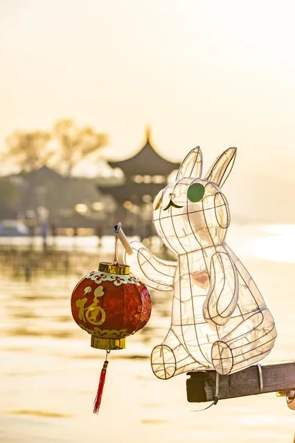 A rowboat equipped with a rabbit-shaped lantern is docked at the West Lake to welcome the Chinese Lunar New Year, the Year of the Rabbit, on January 11, 2023 in Hangzhou, Zhejiang Province of China. (Photo by VCG/VCG via Getty Images)