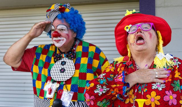 Dressed as “Sunshine” and “Jingles”, husband-and-wife clowning team Christine, right, and George Rotas stand for the national anthem during the annual Calam Shriners Circus held at Bengal Field on Thursday, June 12, 2025 in Lewiston, Idaho. (Photo by USA Today)