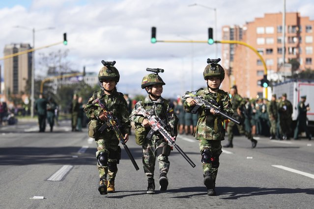Children dressed as soldiers march during an Independence Day military parade in Bogota, Colombia, Sunday, July 20, 2025. (Photo by Fernando Vergara/AP Photo)