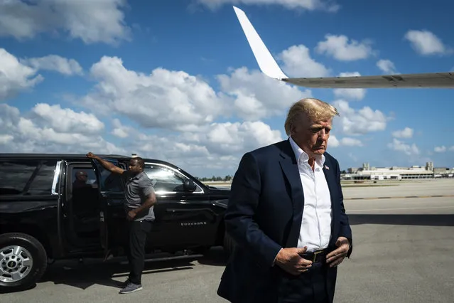 Former President Donald Trump boards his airplane known as “Trump Force One”  to visit East Palestine, Ohio, following the Feb. 3 Norfolk Southern freight train derailment, from Palm Beach International Airport on Wednesday, Feb. 22, 2023, in West Palm Beach FL. (Photo by Jabin Botsford/The Washington Post)
