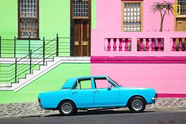 “Sugar and Gum Drops”. “The colorful streets of Bo Kaap in South Africa weren’t always this way. The facades were once mandated to be a drab, uniform color during Apartheid. Afterward, the residents painted their homes every color of the rainbow to celebrate their freedom from oppression”. (Photo by Stephanie Miller/National Geographic Travel Photographer of the Year Contest)