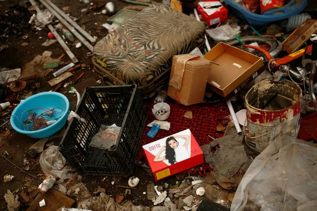 A view of various types of trash scattered on the ground at a recycling yard at the edge of Beijing, China, September 21, 2016. (Photo by Thomas Peter/Reuters)