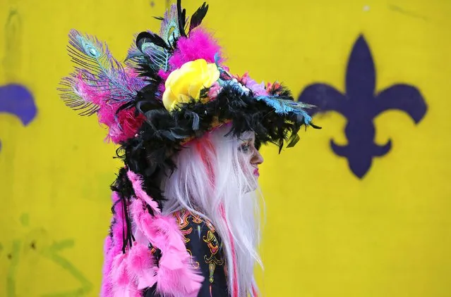A member of the Mondo Kayo Social and Marching Club parades down St. Charles Avenue on Mardi Gras in New Orleans, Louisiana February 17, 2015. (Photo by Jonathan Bachman/Reuters)